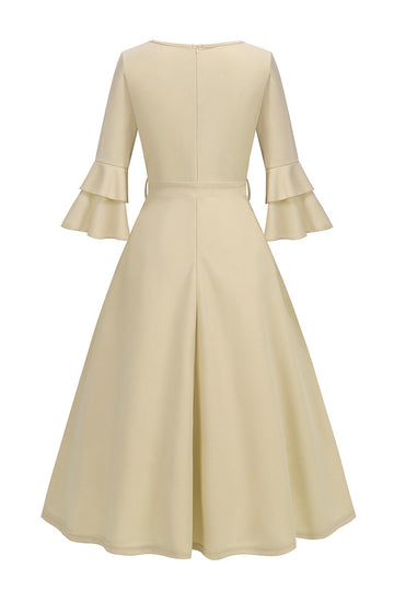 Vestido midi de 1950 con escote en V y media manga color albaricoque